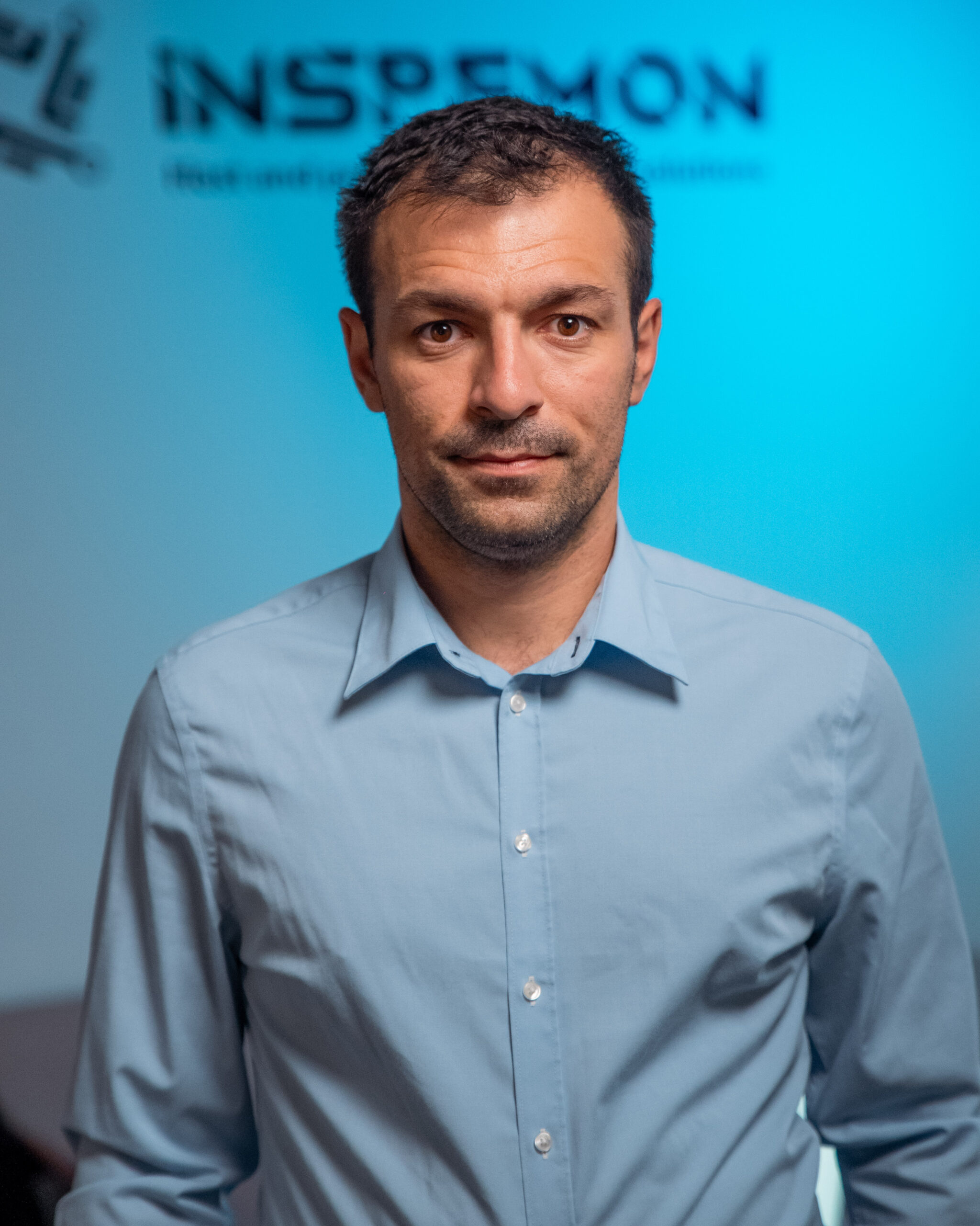 Portrait of Benjamin, CEO of Inspemon, in a professional setting.