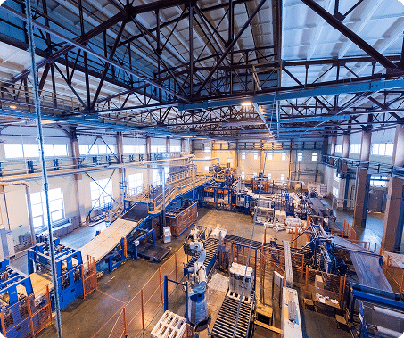 AI-generated image of an industrial site with buildings, machinery, and infrastructure layout.